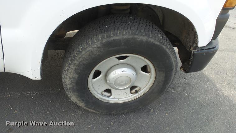 image for item DC0564 2008 Ford F350 Crew Cab utility bed pickup truck