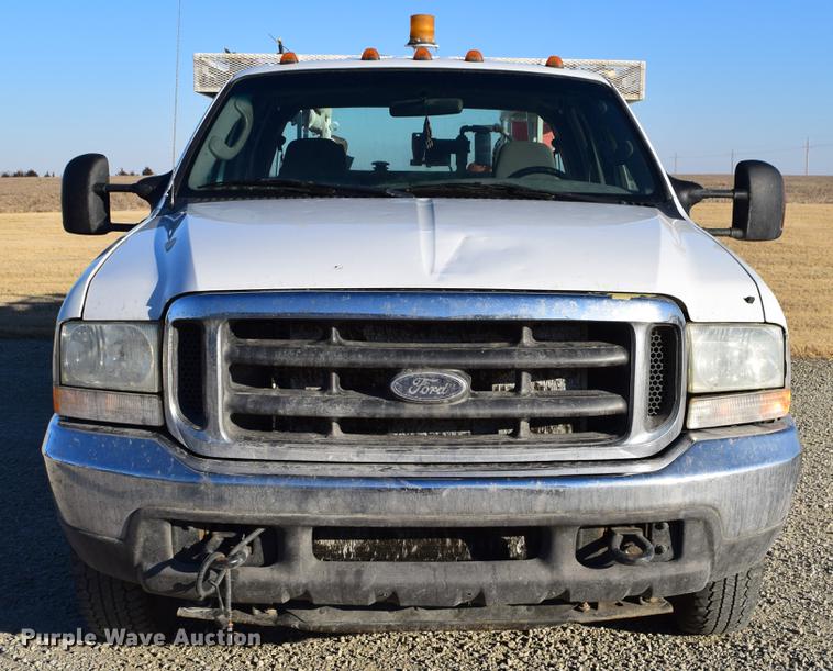 image for item DC7746 2004 Ford F350 Super Duty XLT Crew Cab utility bed pickup truck