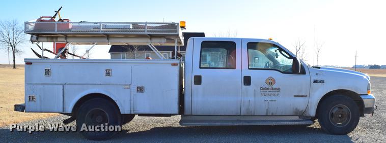 image for item DC7746 2004 Ford F350 Super Duty XLT Crew Cab utility bed pickup truck