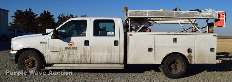 image for item DC7746 2004 Ford F350 Super Duty XLT Crew Cab utility bed pickup truck