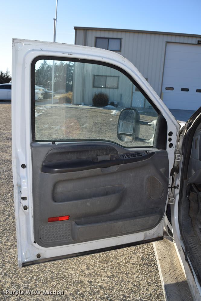 image for item DC7746 2004 Ford F350 Super Duty XLT Crew Cab utility bed pickup truck