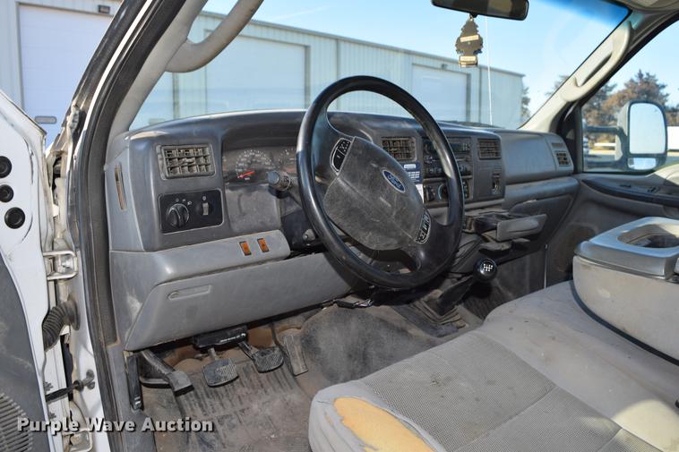 image for item DC7746 2004 Ford F350 Super Duty XLT Crew Cab utility bed pickup truck