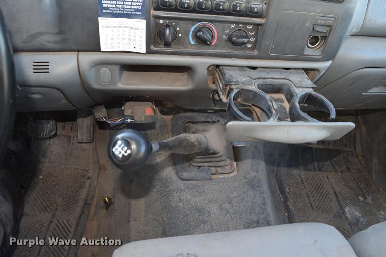 image for item DC7746 2004 Ford F350 Super Duty XLT Crew Cab utility bed pickup truck