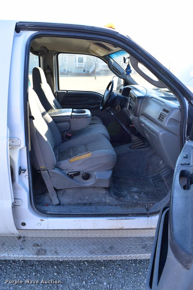 image for item DC7746 2004 Ford F350 Super Duty XLT Crew Cab utility bed pickup truck