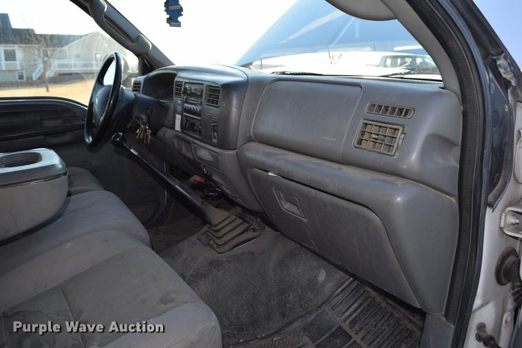 image for item DC7746 2004 Ford F350 Super Duty XLT Crew Cab utility bed pickup truck