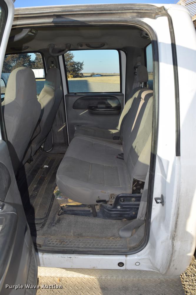 image for item DC7746 2004 Ford F350 Super Duty XLT Crew Cab utility bed pickup truck