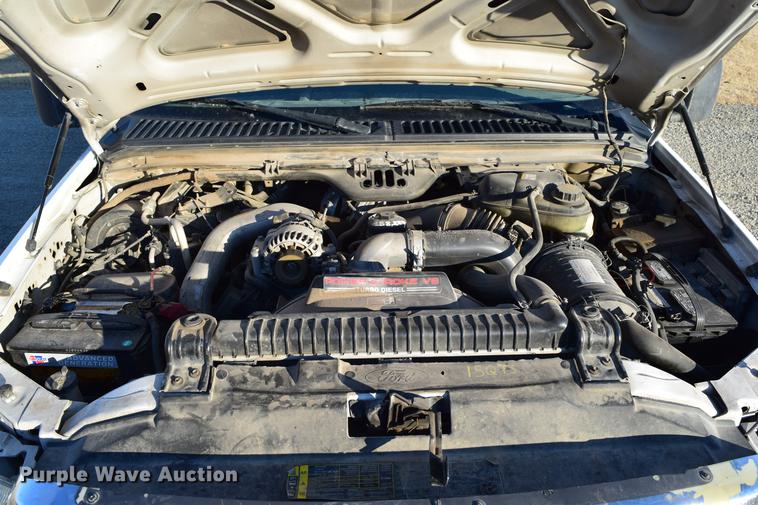 image for item DC7746 2004 Ford F350 Super Duty XLT Crew Cab utility bed pickup truck