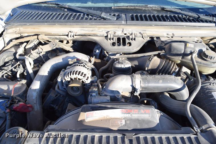 image for item DC7746 2004 Ford F350 Super Duty XLT Crew Cab utility bed pickup truck