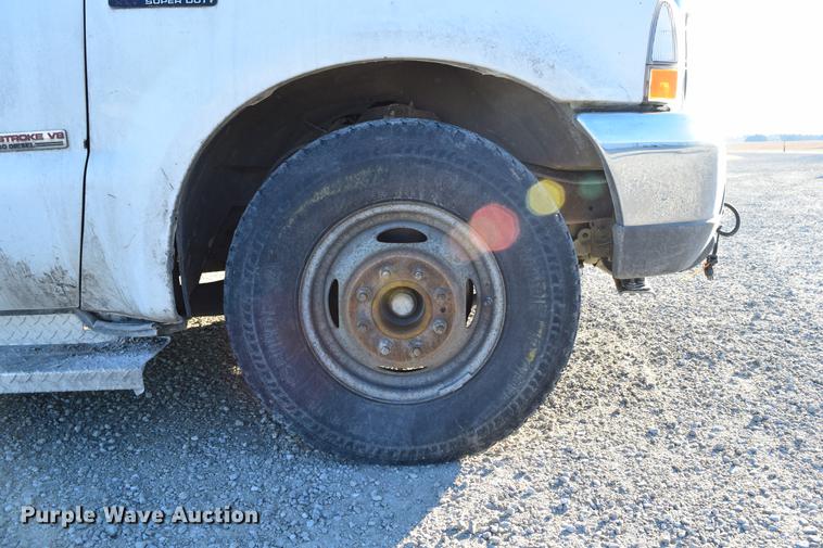 image for item DC7746 2004 Ford F350 Super Duty XLT Crew Cab utility bed pickup truck