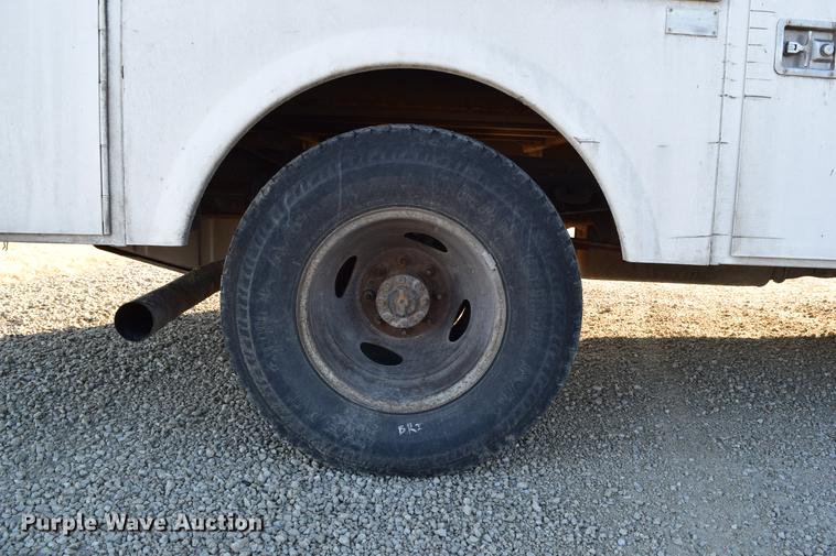 image for item DC7746 2004 Ford F350 Super Duty XLT Crew Cab utility bed pickup truck