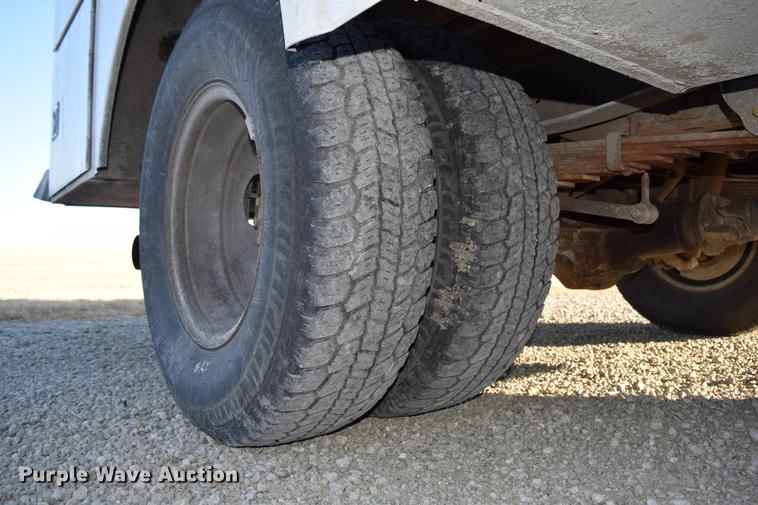 image for item DC7746 2004 Ford F350 Super Duty XLT Crew Cab utility bed pickup truck