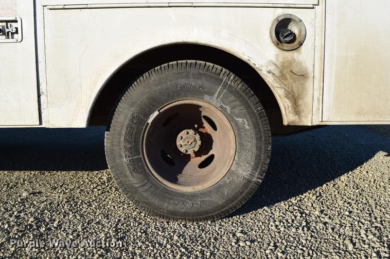 image for item DC7746 2004 Ford F350 Super Duty XLT Crew Cab utility bed pickup truck