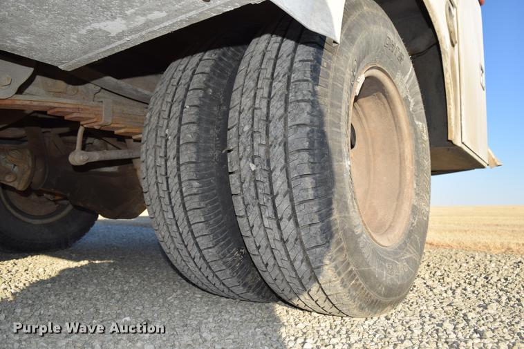 image for item DC7746 2004 Ford F350 Super Duty XLT Crew Cab utility bed pickup truck