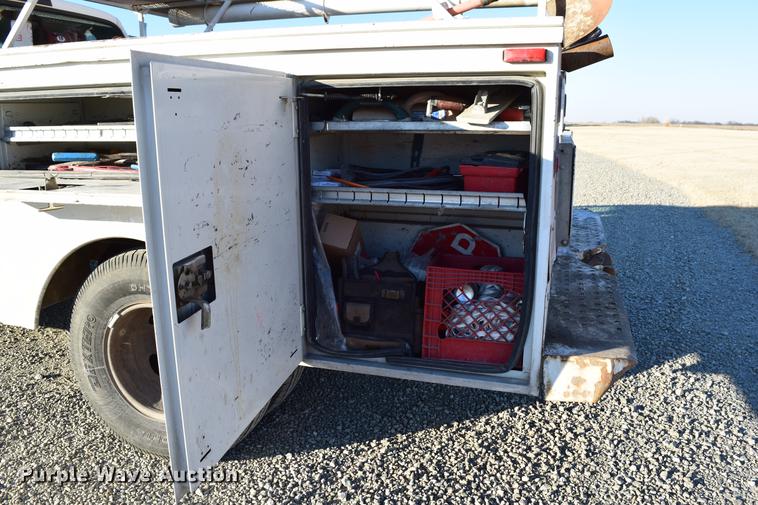 image for item DC7746 2004 Ford F350 Super Duty XLT Crew Cab utility bed pickup truck