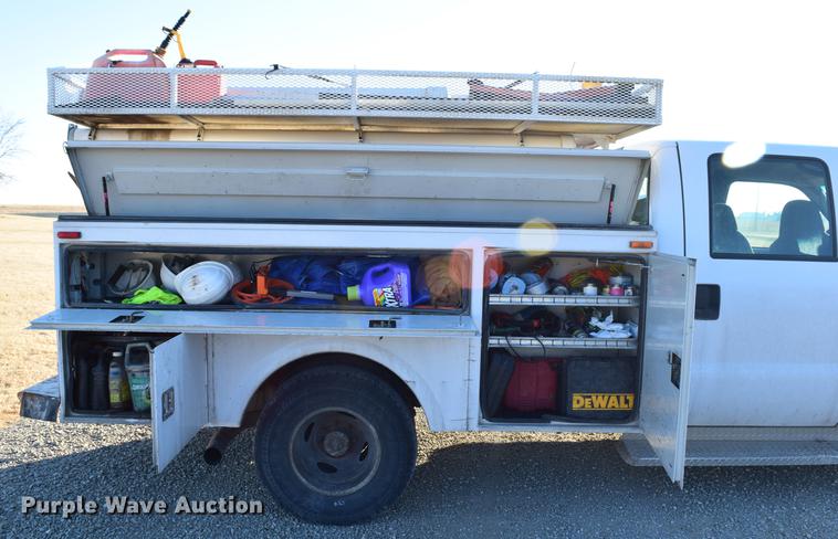 image for item DC7746 2004 Ford F350 Super Duty XLT Crew Cab utility bed pickup truck