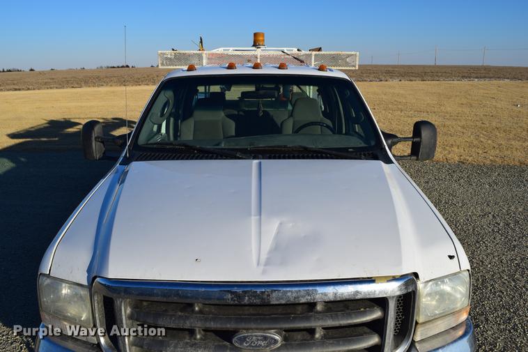 image for item DC7746 2004 Ford F350 Super Duty XLT Crew Cab utility bed pickup truck