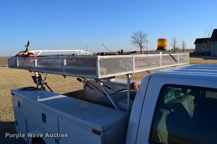 image for item DC7746 2004 Ford F350 Super Duty XLT Crew Cab utility bed pickup truck