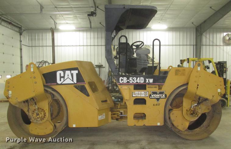 image for item DD2918 2003 Caterpillar CB534D XW double drum vibratory roller