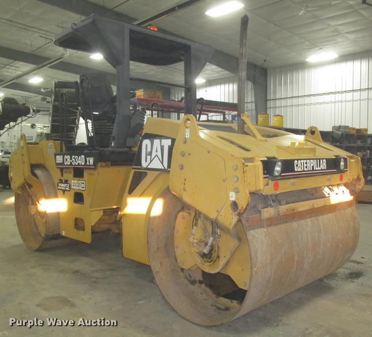 image for item DD2918 2003 Caterpillar CB534D XW double drum vibratory roller