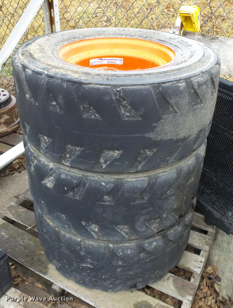 image for item DP9593 (4) Bobcat 12-16.5 foam filled tires and wheels