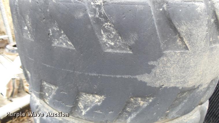 image for item DP9593 (4) Bobcat 12-16.5 foam filled tires and wheels