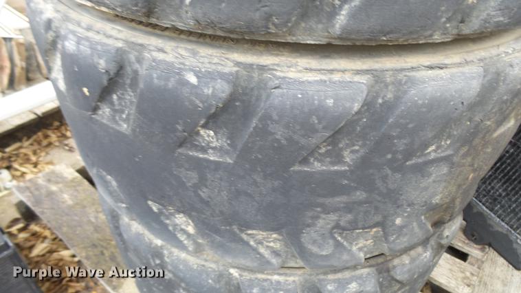 image for item DP9593 (4) Bobcat 12-16.5 foam filled tires and wheels