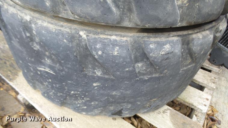 image for item DP9593 (4) Bobcat 12-16.5 foam filled tires and wheels