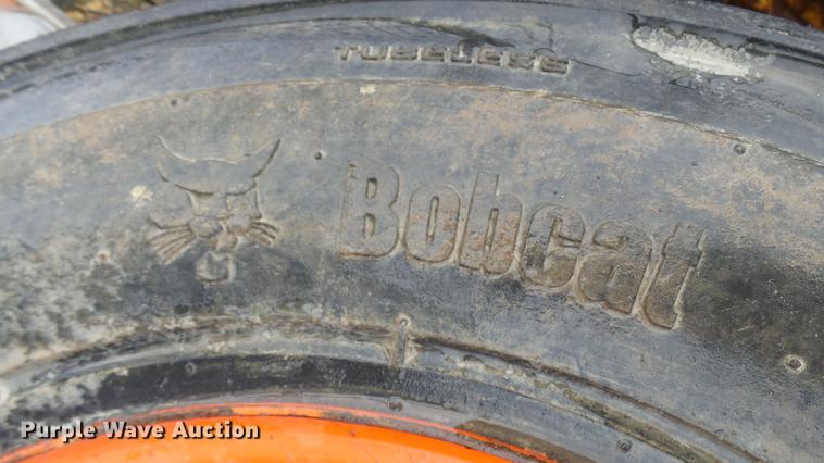 image for item DP9593 (4) Bobcat 12-16.5 foam filled tires and wheels