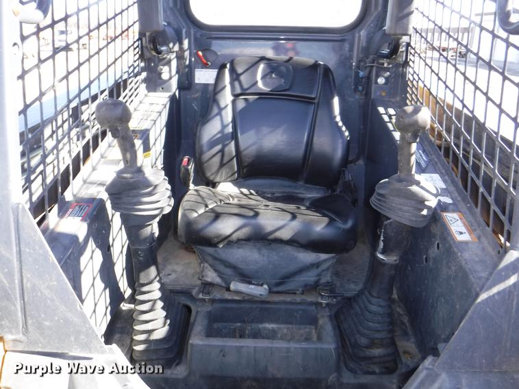image for item EP9172 2013 John Deere 318D skid steer