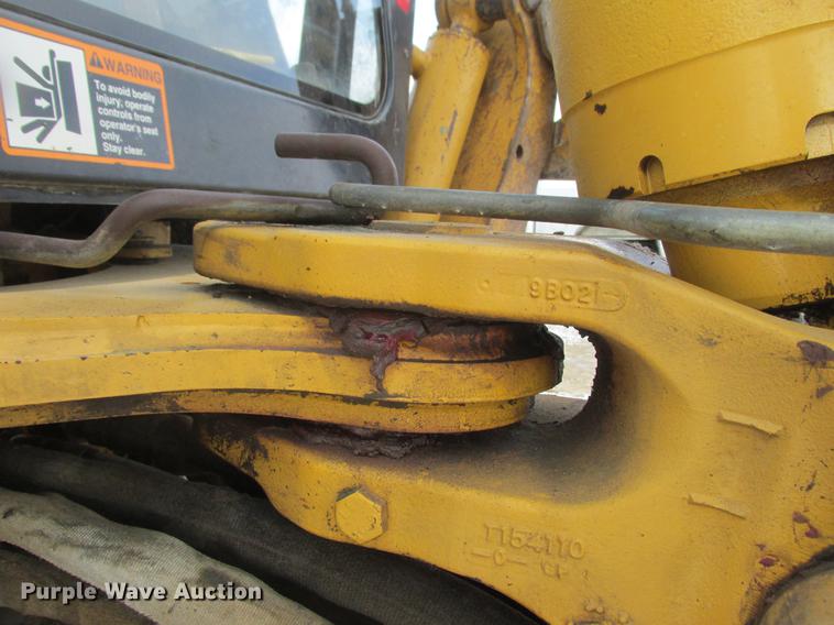 image for item K6062 1999 John Deere 410E backhoe