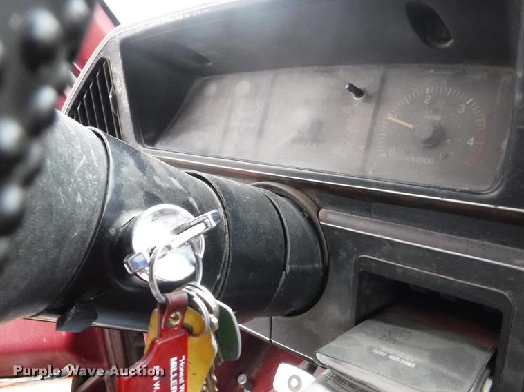 image for item DB3941 1989 Ford F250 XLT Lariat flatbed pickup truck