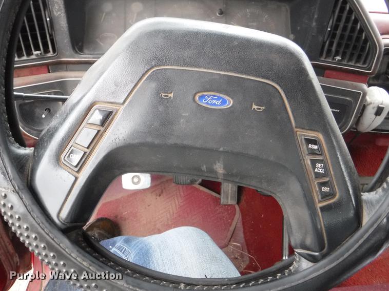 image for item DB3941 1989 Ford F250 XLT Lariat flatbed pickup truck