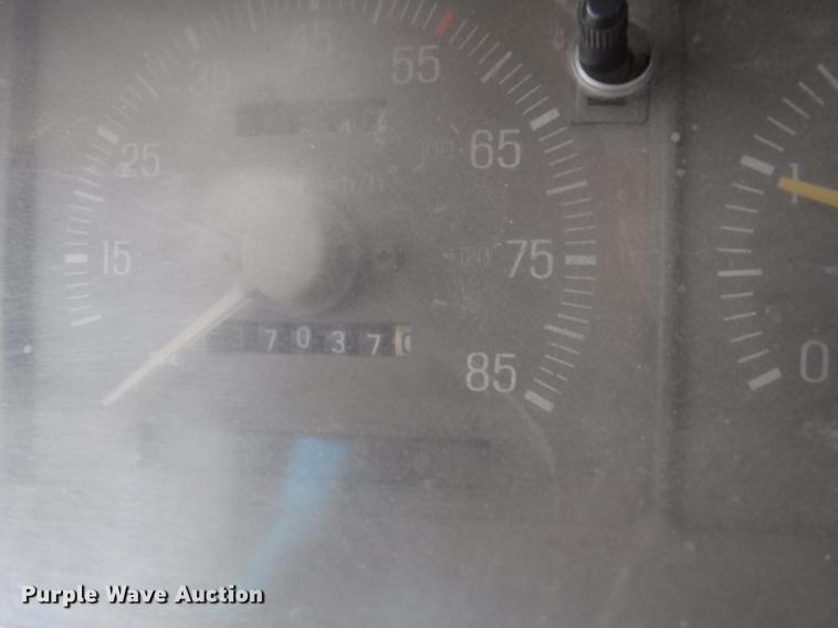 image for item DB3941 1989 Ford F250 XLT Lariat flatbed pickup truck