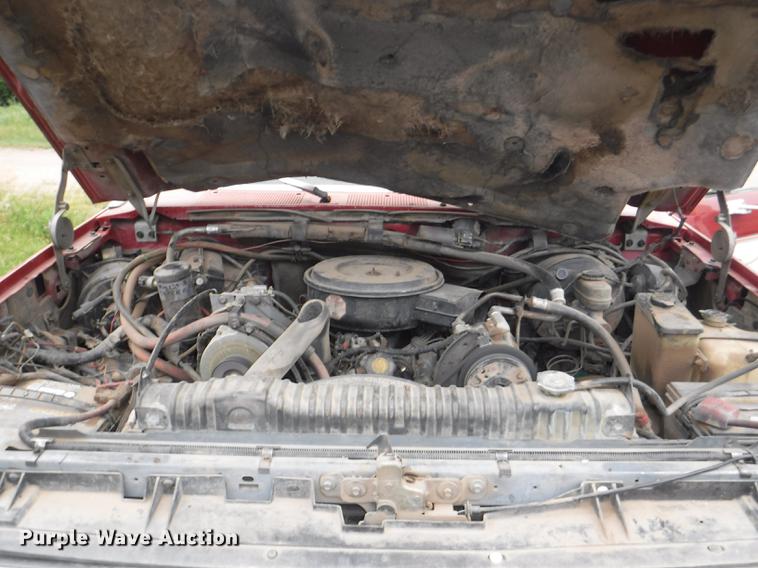 image for item DB3941 1989 Ford F250 XLT Lariat flatbed pickup truck