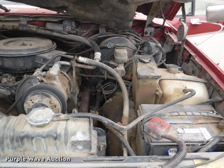 image for item DB3941 1989 Ford F250 XLT Lariat flatbed pickup truck