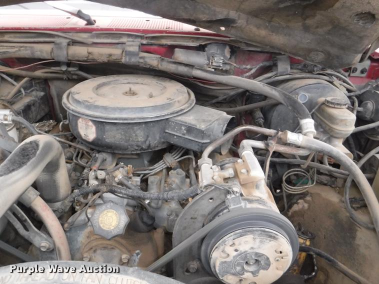 image for item DB3941 1989 Ford F250 XLT Lariat flatbed pickup truck