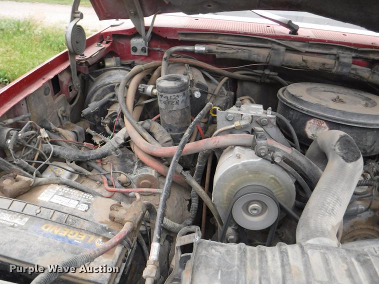 image for item DB3941 1989 Ford F250 XLT Lariat flatbed pickup truck