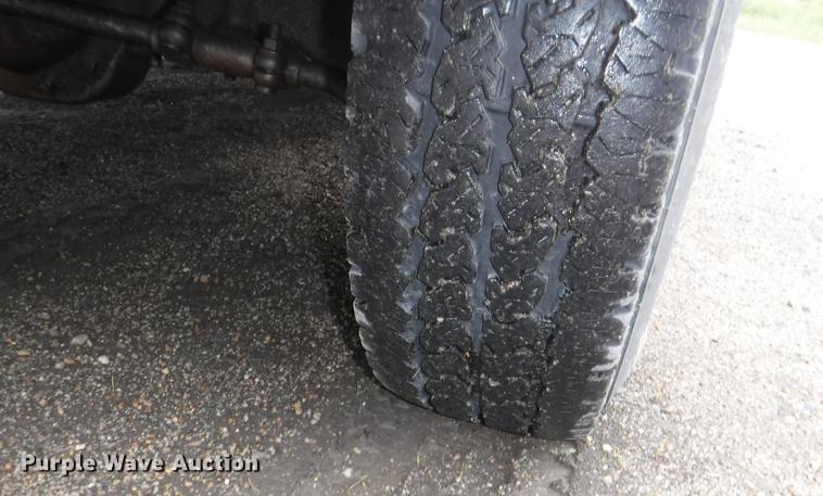 image for item DB3941 1989 Ford F250 XLT Lariat flatbed pickup truck