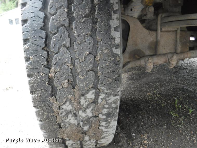 image for item DB3941 1989 Ford F250 XLT Lariat flatbed pickup truck