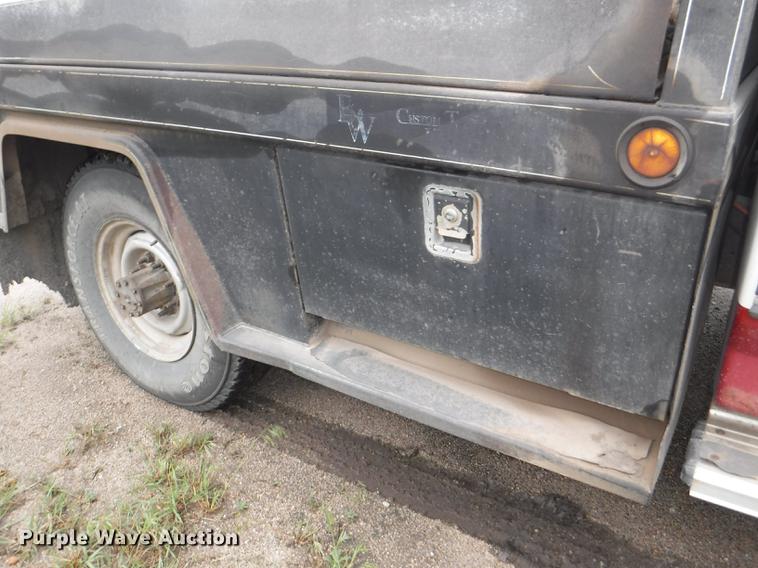 image for item DB3941 1989 Ford F250 XLT Lariat flatbed pickup truck