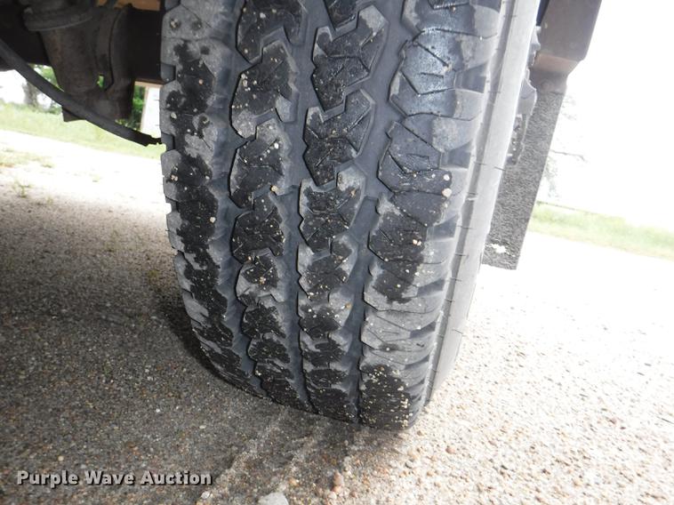 image for item DB3941 1989 Ford F250 XLT Lariat flatbed pickup truck