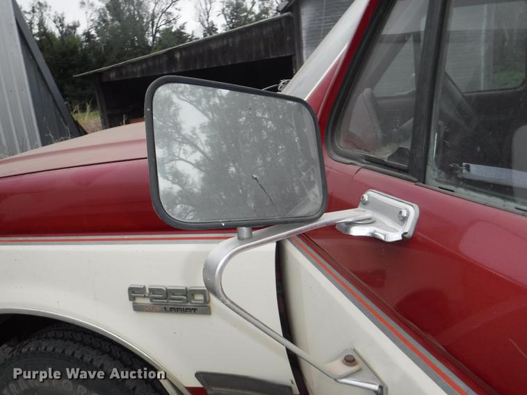 image for item DB3941 1989 Ford F250 XLT Lariat flatbed pickup truck