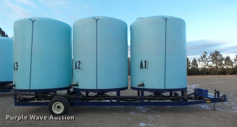 image for item DC8334 2010 JD Skiles triple tip tank trailer