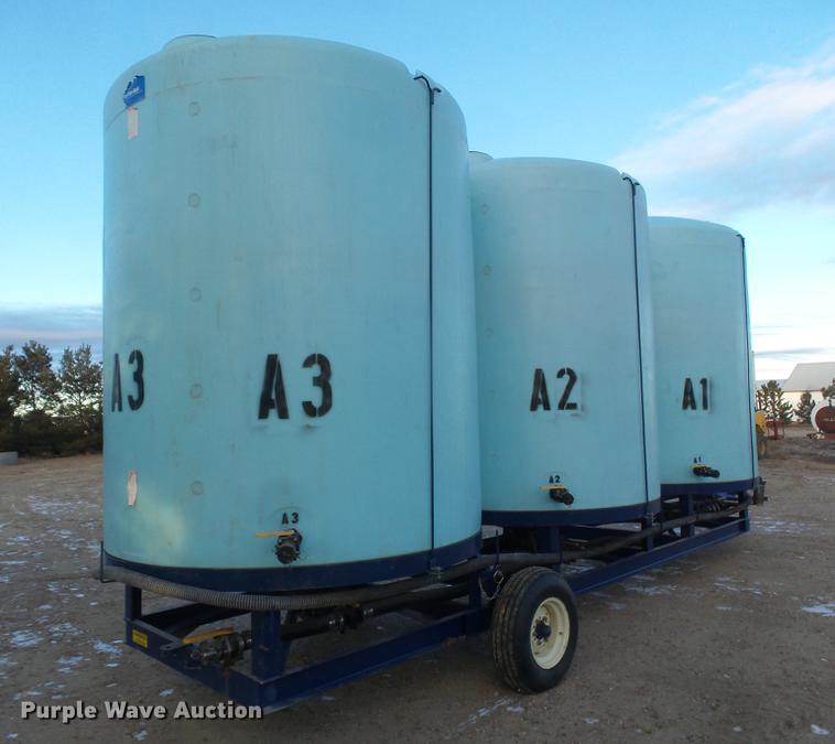 image for item DC8334 2010 JD Skiles triple tip tank trailer