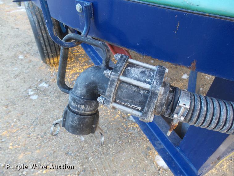 image for item DC8334 2010 JD Skiles triple tip tank trailer