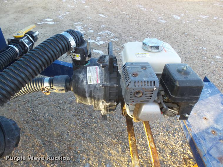 image for item DC8336 2010 JD Skiles triple tip tank trailer