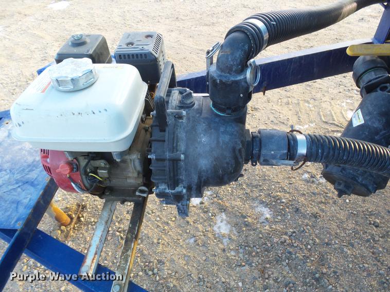 image for item DC8336 2010 JD Skiles triple tip tank trailer