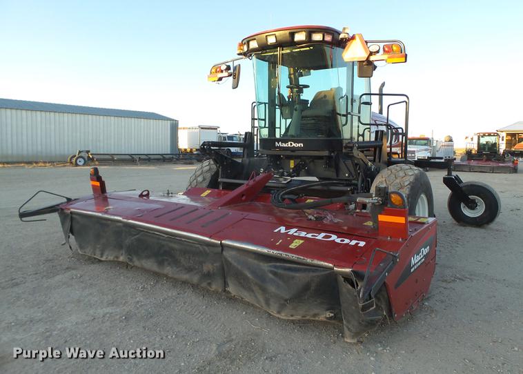 image for item BJ9798 2014 MacDon M205 self-propelled windrower