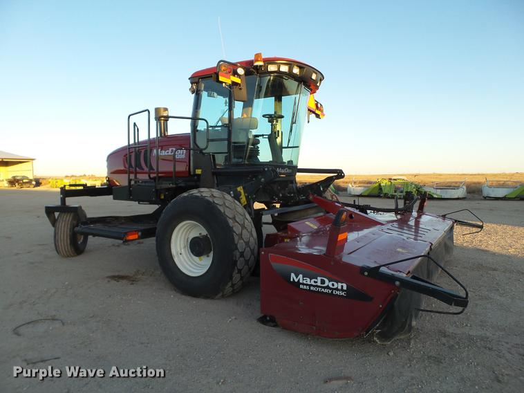image for item BJ9798 2014 MacDon M205 self-propelled windrower
