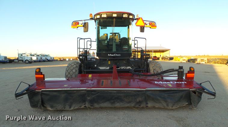 image for item BJ9798 2014 MacDon M205 self-propelled windrower